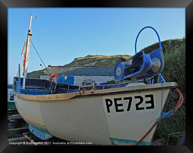 Boat at Lulworth Cove Framed Print by Beth Hartley