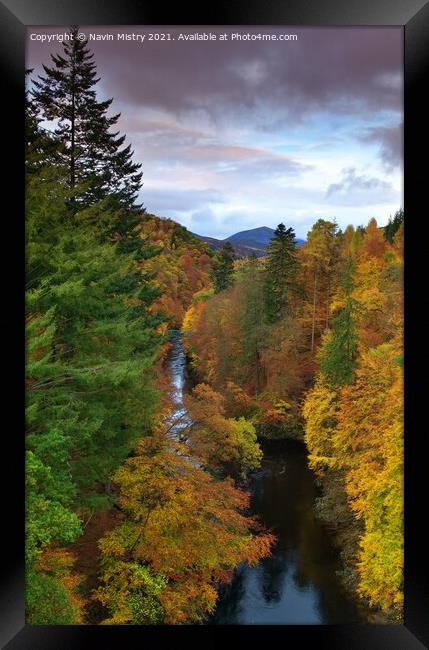 Autumn colours line the River Tummel near Pitlochry, Perthshire Framed Print by Navin Mistry
