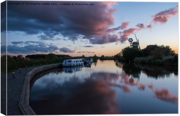 Norfolk Broads windmill sunset Canvas Print by Christopher Keeley