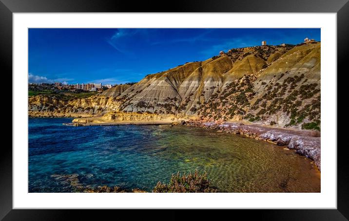 Blue coastline with hillside of the Maltese Island Framed Mounted Print by Maggie Bajada