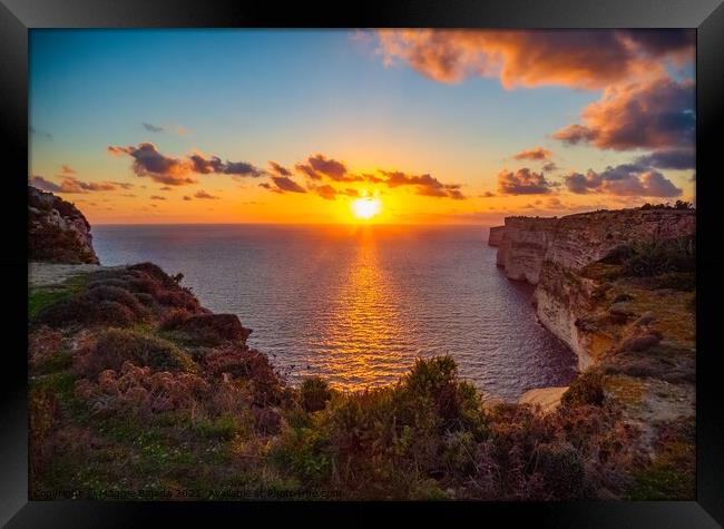 Picturesque Sunset with surrounding cliffs of the  Framed Print by Maggie Bajada