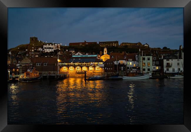 Whitby Harbour at dusk Framed Print by Chris Yaxley