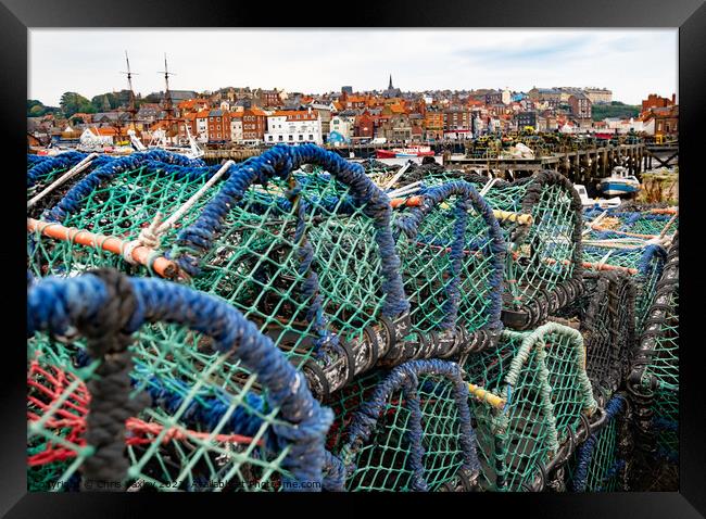 Crab pots and lobster traps in Whitby Harbour, North Yorkshire Framed Print by Chris Yaxley