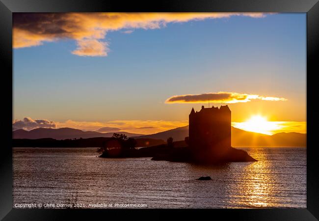 Sunset at Castle Stalker in the Scottish Highlands Framed Print by Chris Dorney