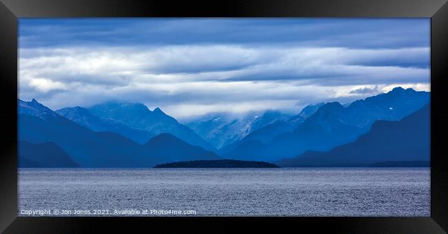 Fiordland Mountain Range in New Zealand Framed Print by Jon Jones