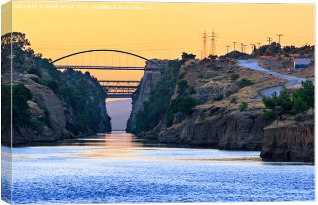 The Corinth Canal transport corridor between two seas in Greece in the early morning haze. Canvas Print by Sergii Petruk