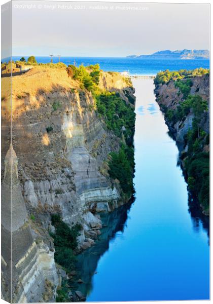 The narrow Corinth Canal in Greece, connecting the Aegean and Ionian Seas. Landscape on a sunny day. Canvas Print by Sergii Petruk