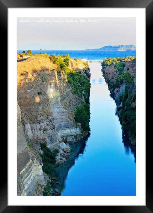 The narrow Corinth Canal in Greece, connecting the Aegean and Ionian Seas. Landscape on a sunny day. Framed Mounted Print by Sergii Petruk