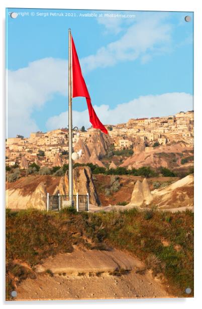 Turkey's large national flag towers over the ancient village of Uchisar in Cappadocia. Acrylic by Sergii Petruk