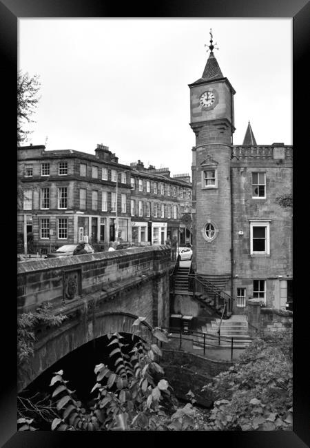 Clocktower and bridge at Stockbridge Framed Print by Theo Spanellis