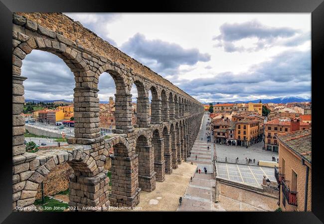 Roman Aqueduct at Segovia in Spain  Framed Print by Jon Jones