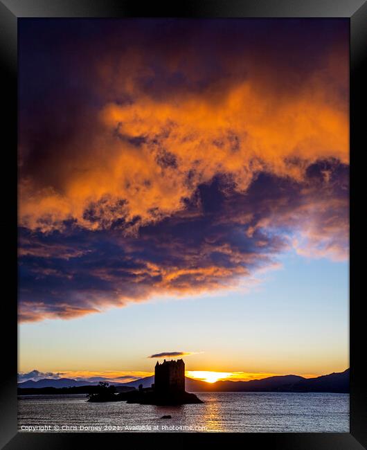 Sunset View of Castle Stalker in the Highlands of Scotland Framed Print by Chris Dorney