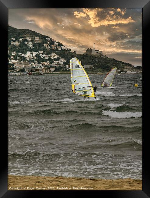Windsurfing off the Coast of Roses Framed Print by Roger Mechan