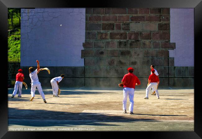 The Thrilling Pelota Match Framed Print by Roger Mechan