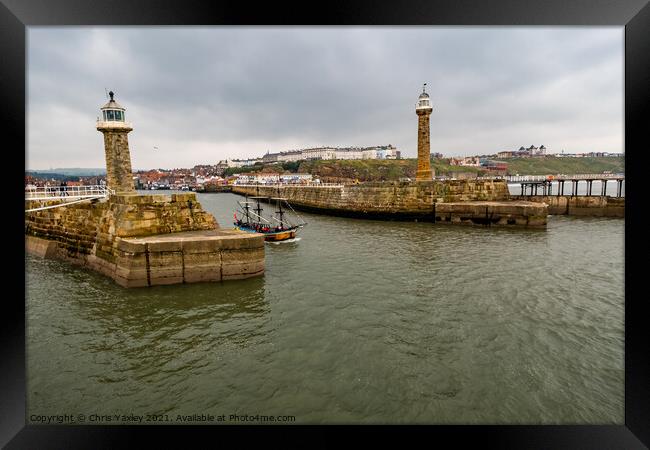 Boat leaving Whitby Harbour, North Yorkshire Framed Print by Chris Yaxley
