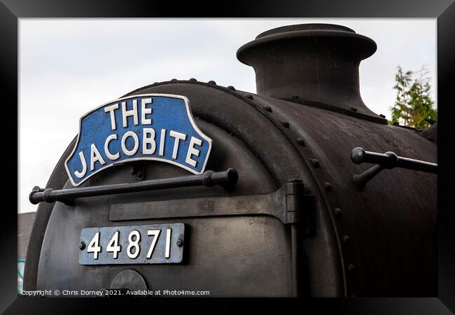 The Jacobite Steam Train in the Highlands of Scotl Framed Print by Chris Dorney