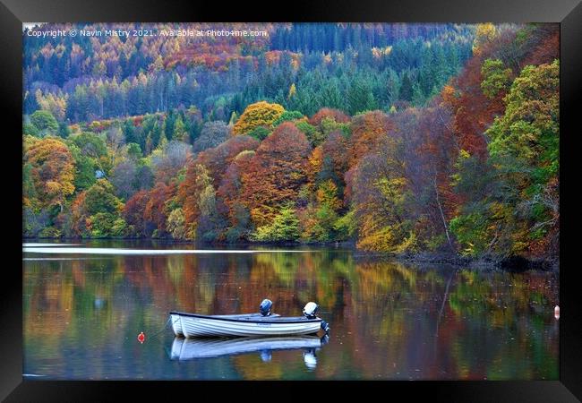  A small boat in Loch Faskally in Autumn  Framed Print by Navin Mistry