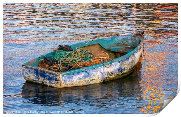Enduring Beauty of a weather-worn boat Print by Roger Dutton