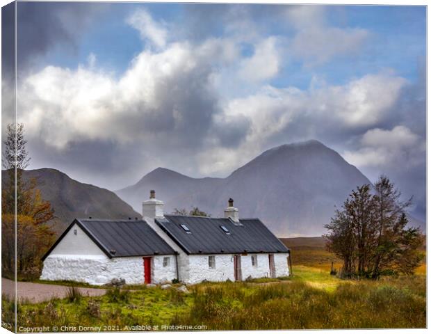 Blackrock Cottage in Glencoe, Scotland Canvas Print by Chris Dorney