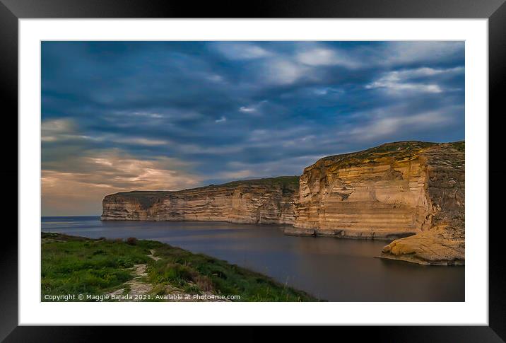 Sunset with Ciffs, Blue Sea and land at Xlendi Bay Framed Mounted Print by Maggie Bajada