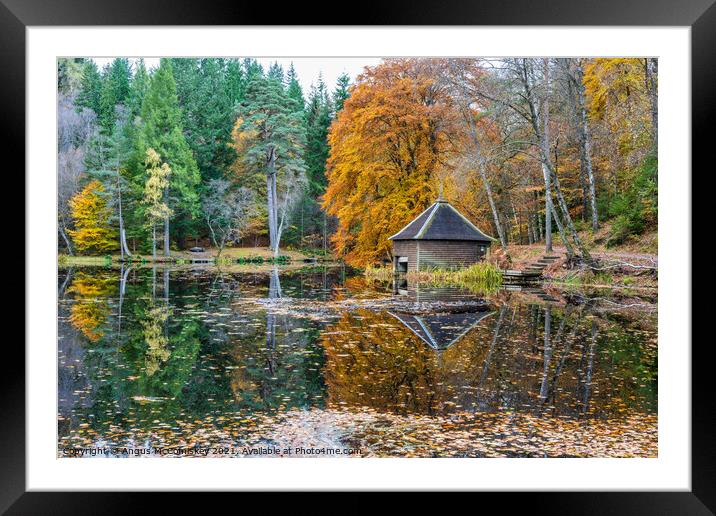 Loch Dunmore boathouse, autumn colours Framed Mounted Print by Angus McComiskey