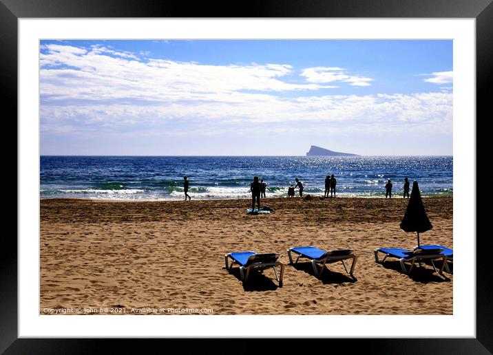 Beach silhouette, Benidorm, Spain. Framed Mounted Print by john hill