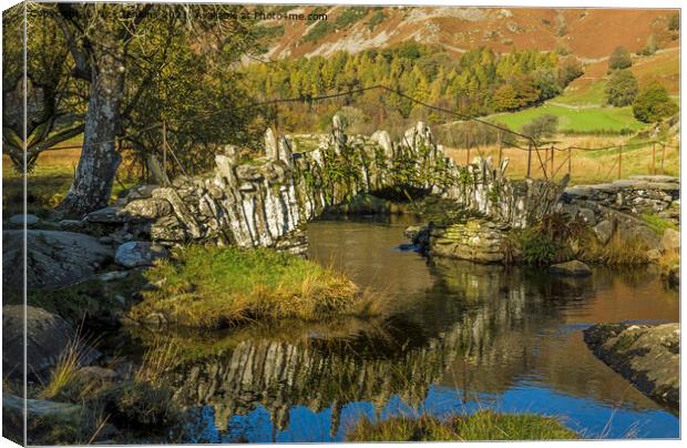 Slaters Bridge reflected in Little Langdale Valley Canvas Print by Nick Jenkins