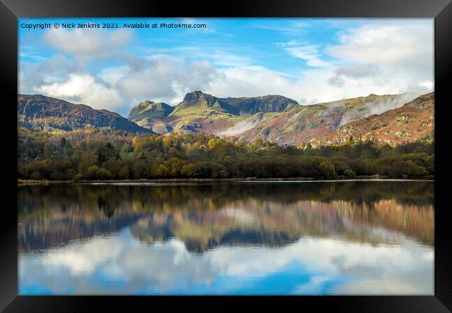 Langdale Pikes reflected in Elterwater Lake  Framed Print by Nick Jenkins