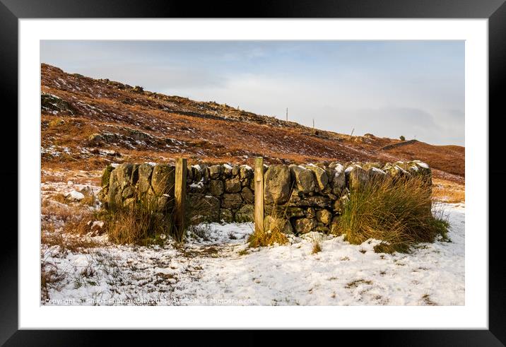 An old snow covered scottish drystone dyke sheep fold in winter, Scotland Framed Mounted Print by SnapT Photography