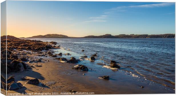 Sunset over a Scottish coastline in winter at a sandy beach at Kirkcudbright Bay Canvas Print by SnapT Photography
