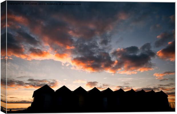 Silhouetted Beach Huts at Blyth (2) Canvas Print by Jim Jones