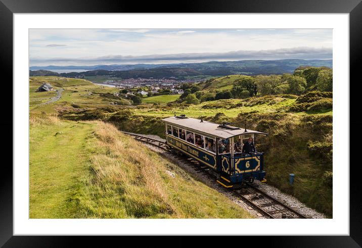 Great Orme tram going up to the summit Framed Mounted Print by Jason Wells