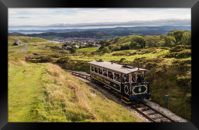 Great Orme tram going up to the summit Framed Print by Jason Wells