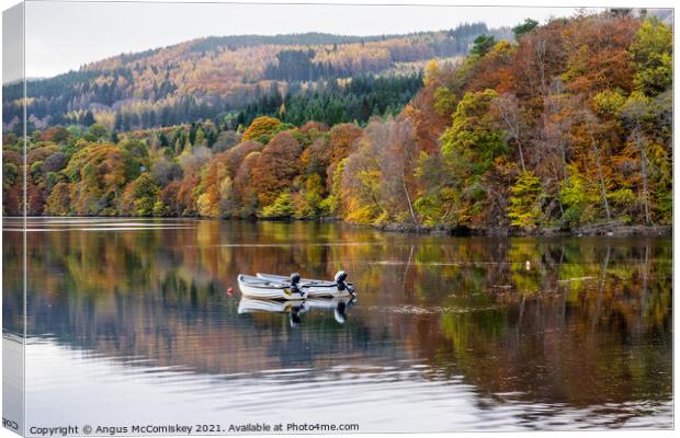 Moored boats on Loch Faskally, Perthshire Canvas Print by Angus McComiskey
