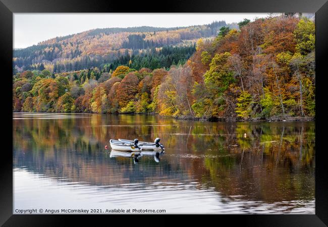 Moored boats on Loch Faskally, Perthshire Framed Print by Angus McComiskey