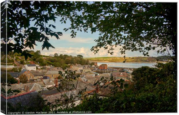 Looking through the trees over Padstow, Cornwall Canvas Print by Gordon Maclaren