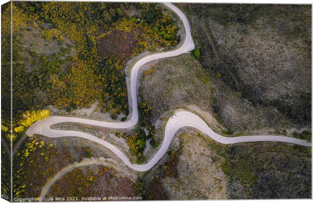 Beautiful drone aerial top view of road with curves in mountain landscape with a van social distancing near Piodao, Serra da Estrela in Portugal Canvas Print by Luis Pina