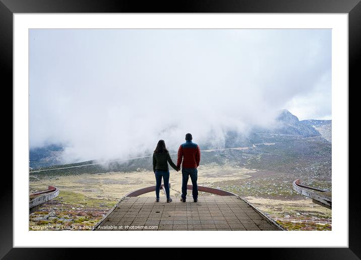 Couple holding hands on an abandoned cableway platform building social distancing beautiful landscape in Serra da Estrela, Portugal Framed Mounted Print by Luis Pina
