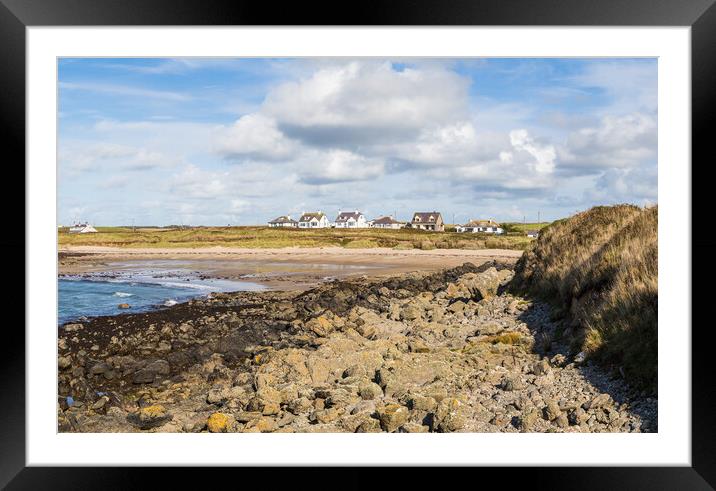Houses look out on Porth Trecastell Framed Mounted Print by Jason Wells