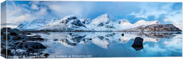 Winter mountain reflections, Lofoten, Norway. Canvas Print by Justin Foulkes