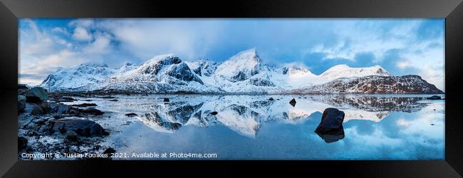 Winter mountain reflections, Lofoten, Norway. Framed Print by Justin Foulkes