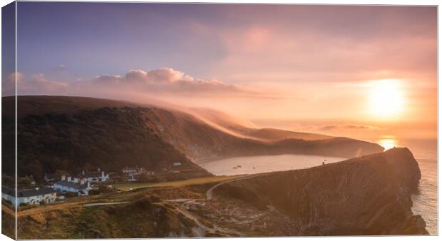Misty Lulworth Cove sunrise from Stair Hole Canvas Print by Kevin Browne