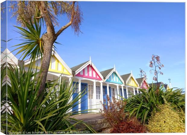 Colourful Beachfront Haven Canvas Print by Les Schofield