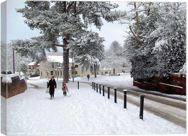 Snowfall in Horsell, Surrey. Canvas Print by Laura Jarvis