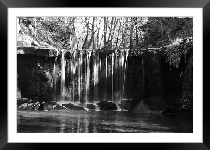 Waterfall with misty water with sun rays  Framed Mounted Print by Andrew Heaps