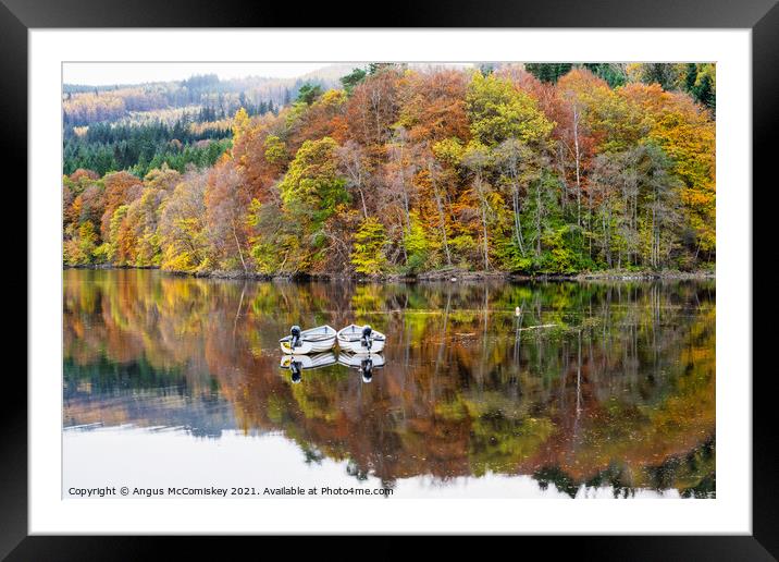 Boats moored on Loch Faskally, Perthshire Framed Mounted Print by Angus McComiskey