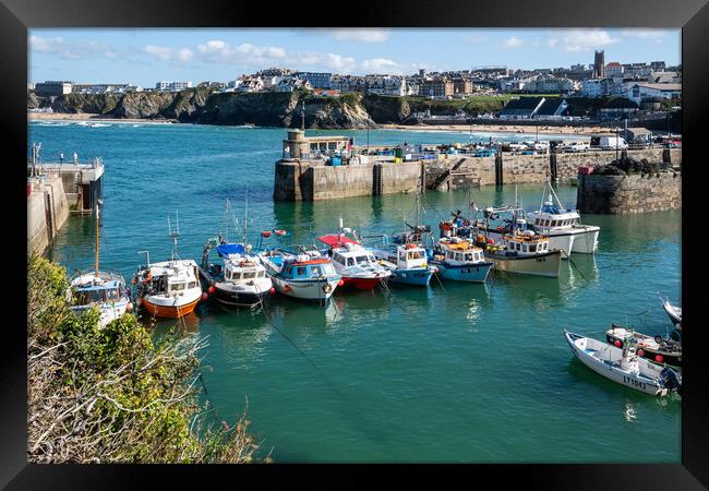 Boats lined up at Newquay Harbour  Framed Print by Tony Twyman
