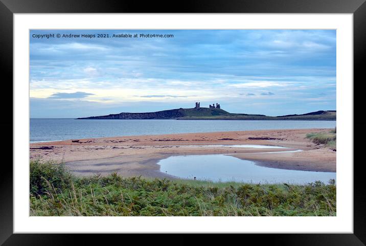 Dunstanburgh Castle viewed from beach. Framed Mounted Print by Andrew Heaps