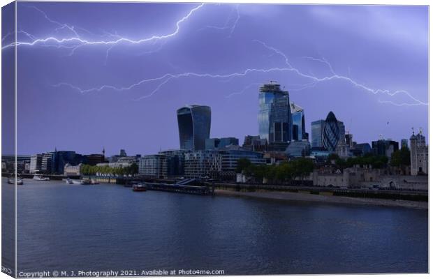 Lightning over the City of London and river Thames in England Canvas Print by M. J. Photography