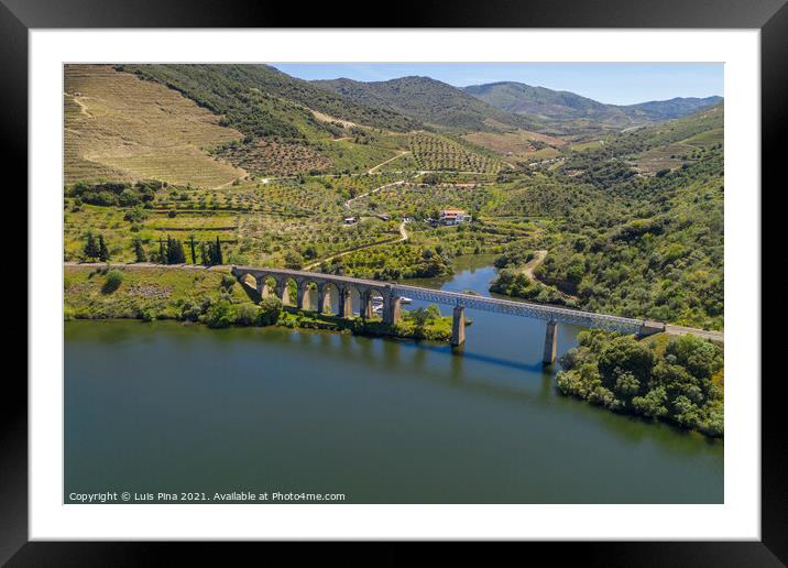 Bridge drone view like Harry Potter movie in Douro River Region, in Portugal Framed Mounted Print by Luis Pina